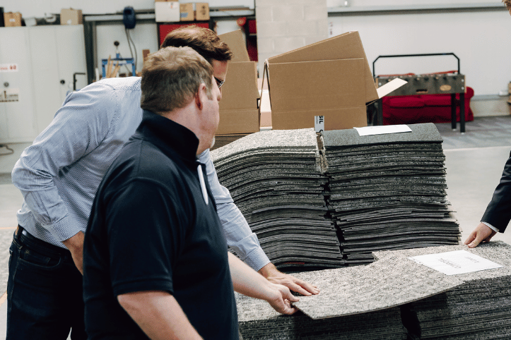 Stock of refurbished carpet tiles ready for reuse